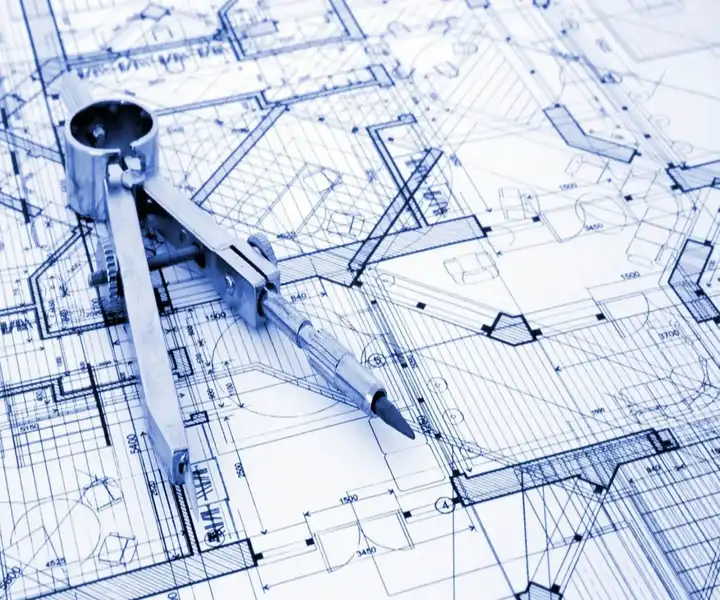 architectural blueprints with a compass and drafting pencil, illustrating detailed floor plans and calculations.