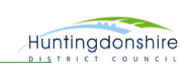 Huntingdonshire District Council logo presenting with blue and green elements with the text "Huntingdonshire District Council" clearly written.
