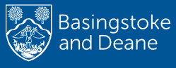 Basingstoke and Deane logo present a shield with trees, mountains, and a central figure, designed on a blue background.